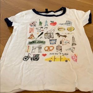 A J. Crew shirt with prints on the front.